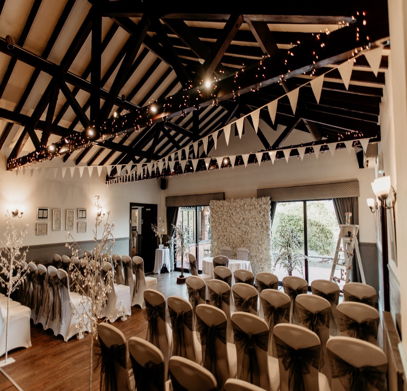 Garden Suite set for a civil wedding ceremony at Oak Farm Hotel